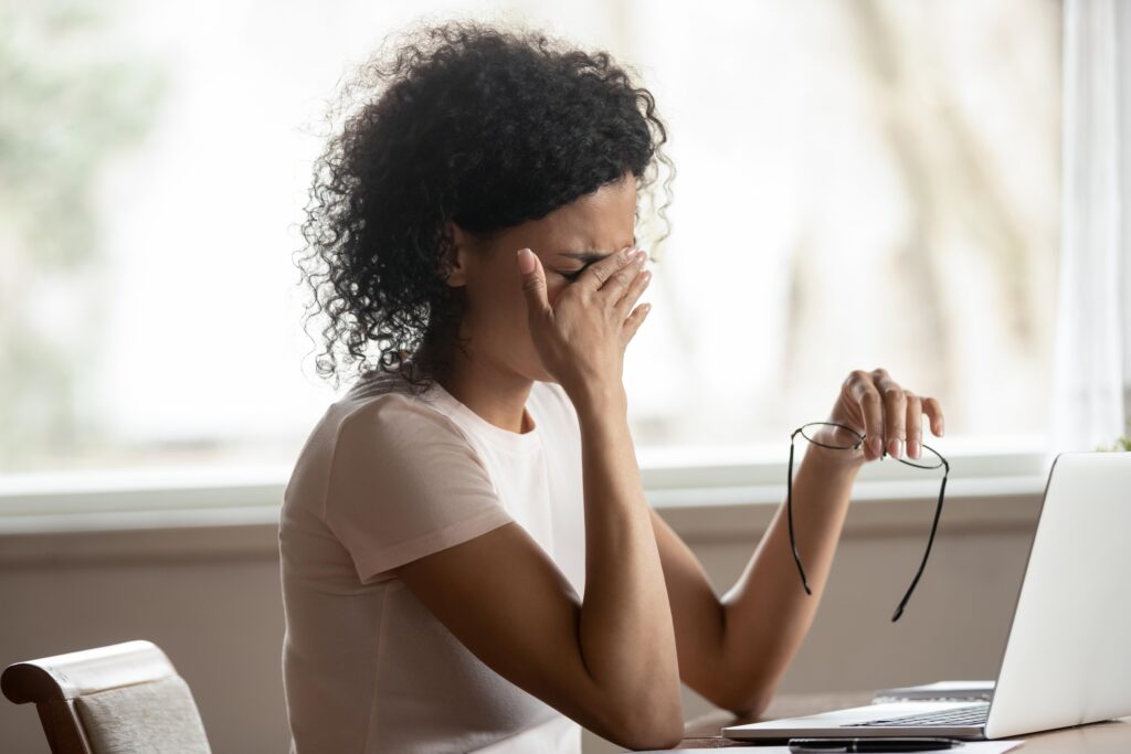 Exhausted African American Young Woman Sit Table Working Take Off Glasses Suffer From Blurry Vision Dizziness Tired Biracial Female Struggle With Migraine Headache Have Sight Problems Exhausted African American Young Woman Sit Table Working Take Off Glasses Suffer From Blurry Vision Dizziness Tired Biracial Female Struggle With Migraine Headache Have Sight Problems