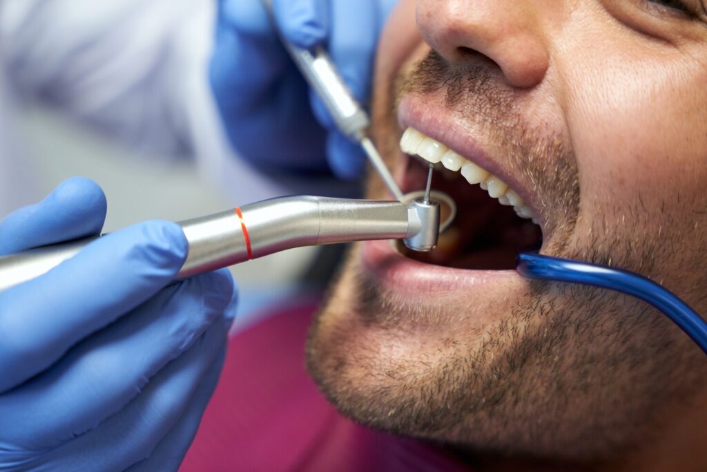 Fragment Photo Dental Drill Use Man Teeth 386185 1555 Fragment Photo Dental Drill Use Man Teeth 386185 1555