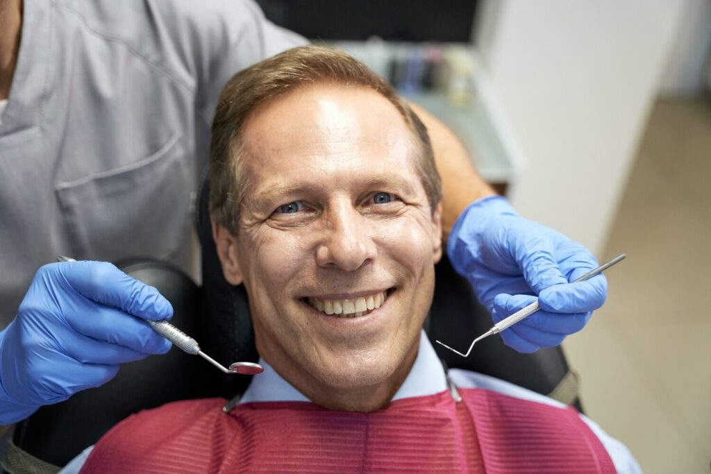 Optimistic Man Enjoying Appointment Trusted Dental Clinic 386185 1567 Optimistic Man Enjoying Appointment Trusted Dental Clinic 386185 1567