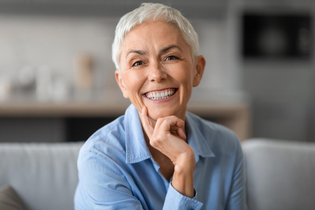 Portrait Lovely Older Woman Smiling Camera Touching Chin 116547 93562 Portrait Lovely Older Woman Smiling Camera Touching Chin 116547 93562